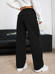 Effortlessly embodying the spirit of contemporary fashion, these Drawstring Waist Plain Parachute Pants are an exquisite blend of comfort and elegance. Crafted with meticulous attention to detail, these pants boast a sophisticated silhouette that effortlessly elevates any ensemble. The absence of embellishments and patterns lends a timeless appeal, making them a staple piece in any discerning fashion enthusiast's wardrobe. Specifications: Style: Casual Pattern Type: Plain Type: Parachute Pants C Elegant Straight Cargo Pants With Pockets, Elegant Wide-leg Pants With Cargo Pockets, Elegant Straight Cargo Pants, Elegant Trousers With Cargo Pockets, Elegant High-waisted Cargo Pants, Elegant Wide-leg Cargo Pants, Chic Black Wide-leg Cargo Pants, Trendy Denim, Dark Shades