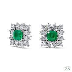 Expertly crafted with stunning emerald stones, these earrings are the epitome of elegance. The vibrant green color complements any outfit, while the high-quality materials ensure long-lasting wear. Add a touch of sophistication to your look with these timeless earrings. Luxury Green Diamond Earrings, Green Diamond Earrings With 17 Jewels For Formal Events, Green Diamond Earrings With 17 Jewels For Formal Occasions, Emerald Diamond Earrings For Formal Occasions, Emerald Diamond Earrings For Formal Events, Formal Emerald Diamond Earrings, Luxury Green Diamond Earrings With Prong Setting, Luxury Emerald Diamond Earrings, Luxury Emerald Cut Diamond Earrings For Formal Occasions