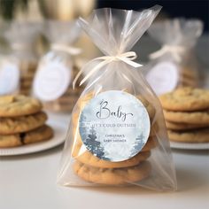 cookies wrapped in clear cellophane are sitting on the table