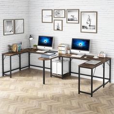 three computer desks sitting on top of a wooden floor