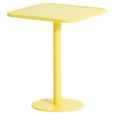 a yellow square table on a white background