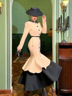 Experience an unparalleled level of sophistication with the Le Palais Vintage Heavy Contrast Air Layer Fishtail Long Coat - Tiramisu. This glamorous and luxurious coat is crafted with a unique design that is chic, stylish and fashionable. Perfect for a stunning formal look, the coat stands out with a dashing, classy, and sophisticated silhouette. Look gorgeous at weddings, church and other formal outings in this elegant and adorable outfit. This chic and stylish coat features a gorgeous, unique Dress And Coat Outfit Wedding, Designer Uniform, Classy Elegant Dresses, Elegant Party Outerwear With Stand Collar, Classic Vintage Outfits For Women, Elegant Evening Outerwear With Stand Collar, Dress And Coat Outfit, Luxury Classic Formal Fur Coat, Luxury Long Sleeve Formal Fur Coat