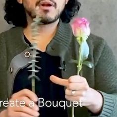 a man holding a rose in front of his face with the caption create a bouquet