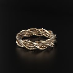 Our Intricate 5 Twisted Bands ring features five different textures that add depth and dimension to the design. The hammered texture creates a rough, uneven surface that catches the light in interesting ways, while the brushed texture adds a subtle sheen that is both elegant and understated. The waved texture creates a flowing, organic feel to the ring, while the thorn texture adds a touch of edginess and intrigue. These textures are expertly combined to create a unique and eye-catching design t Earthy Rings, Rope Wedding Band, Thorn Ring, Infinity Wedding Band, Handmade Wedding Band, Leaf Wedding Band, Modern Wedding Rings, Twisted Band Ring, Handmade Wedding Rings