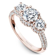 three stone engagement ring in rose gold with diamonds on the band and side stones around the band