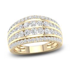 Two rows of dazzling graduated round diamonds are nestled above and below by even more shimmering round diamonds in this luxurious women's multi-row anniversary band. Fashioned in 14K yellow gold, the total diamond weight of the ring is 1 carat. Gold Bands With Diamonds, Thick Wedding Bands, Wedding Bands For Her, Gold Book, Jared The Galleria Of Jewelry, Family Jewels, Honey Pot, Gold Price, Anniversary Bands