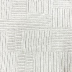 a white rug with lines on it