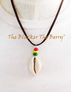 The Rasta necklace and earrings set comes together. The earrings are a cowrie shell with beads which are approximately 2.5 inches long. The brown necklace is adjustable and has a matching pendant. If you have any questions please feel free to contact us at anytime. Our products are not intended for babies or children as we use small pieces, wires and beads. These can be dangerous to them when unsupervised. Gift boxes and gift messages are available for your special orders. If you need the sizes Cowrie Shell Jewelry With Adjustable Cord As Gift, Adjustable Cord Cowrie Shell Jewelry Gift, Adjustable Cord Cowrie Shell Jewelry As A Gift, Handmade Brown Cowrie Shell Jewelry, Bohemian Brown Cowrie Shell Jewelry, Rasta Necklace, The Blacker The Berry, Loc Jewelry, African Earrings