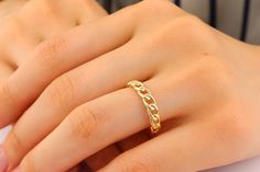 Introducing our exquisite 14K Solid Gold Chain Ring, a true reflection of elegance and timeless beauty. Crafted with precision and care, this ring is made from 14K solid gold, ensuring durability and a stunning shine that will last a lifetime. The delicate chain design adds a touch of sophistication, making it a perfect accessory for any occasion. Each link is meticulously connected, creating a seamless and comfortable fit. This ring is a testament to the craftsmanship and attention to detail th Minimalist Gold Chain Jewelry For Anniversary, Elegant Open Ring Jewelry With Gold Chain, Elegant Tarnish-resistant Chain Ring Gift, Modern Gold Chain Ring For Anniversary, Fine Jewelry Rings With Adjustable Chain For Formal Occasions, Gold Minimalist Chain Ring For Formal Occasions, Elegant Gold Plated Chain Ring For Wedding, Elegant Open Rings With Adjustable Chain, Elegant Open Chain Ring For Promise