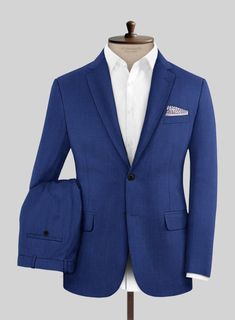 Make a bold statement with our Royal Blue Suit, a mix of impeccable style and unparalleled quality. Expertly crafted from a luxurious wool blend, this suit offers a sleek silhouette and a striking royal blue shade that commands attention. Perfect for making an impression at the office or captivating at special events, our blue suit ensures you're always the best dressed in the room. Experience perfect luxury and comfort, and make every moment an occasion to remember. Elevate your wardrobe today Tailored Royal Blue Suits, Classic Royal Blue Semi-formal Suits, Semi-formal Royal Blue Three-piece Suit With Notch Lapel, Royal Blue Single-breasted Suit With Suit Collar, Fitted Blue Single-button Suit, Tweed Overcoat, Tweed Sport Coat, Harris Tweed Jacket, Brown Corduroy Jacket