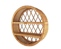 a round wicker shelf with two shelves