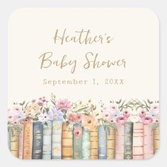 a baby shower sticker with books and flowers on the front, in pastel colors