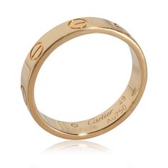 Cartier Love Band in 18k Yellow Gold   PRIMARY DETAILS   SKU: 140023   Listing Title: Cartier Love Band in 18k Yellow Gold   Condition Description: Cartier's Love collection is the epitome of iconic, from the recognizable designs to the history behind the line-up. The collection started in 1969 with the bangle bracelet, which is engraved with a circular motif throughout to mimic the look of the bracelet's signature screw-lock mechanism.       Retails for 1250 USD. In excellent condition and recently polished. Ring size is 49.   Brand: Cartier   Collection/Series: Love   Metal Type: Yellow Gold   Metal Purity: 18k   Ring Size: 49   Pre-Owned Jewelry Condition: Excellent   SIDE STONE INFORMATION   Original Box?: No   Original Papers?: No   This item has been used and may have some minor flaw Cartier Love Band, Cartier Love Collection, Love Band, Cartier Love, Bangle Bracelet, The History, Cartier, Kids Accessories, The Collection