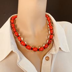 "Immerse yourself in MuranoGlass elegance with our clear bead necklace, featuring a bold red streak--an exquisite fusion of tradition and contemporary style. Length: 40 cm / 15.74\" Weight: 100 gr / 0.2 Lb Trademark Of Origin Code: 093 Discover the exceptional artistry embodied in our Murano Glass Necklace, a testament to meticulous handmade craftsmanship. Each transparent bead unveils a vibrant red streak, intricately woven into the glass, creating a visually stunning and distinctive accent. Th Modern Red Adjustable Necklace, Red Glass Beaded Necklaces With Polished Beads, Clear Glass Round Bead Necklaces, Clear Glass Beaded Necklaces, Clear Glass Round Beads Necklaces, Clear Glass Necklaces With Round Beads, Retro Red Necklace For Party, Red Murano Glass Jewelry For Jewelry Making, Retro Round Beaded Glass Jewelry