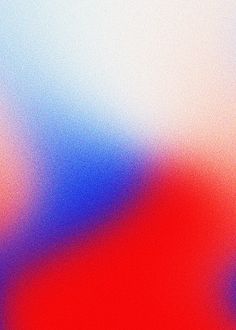 an abstract blurry background with red, blue and white colors