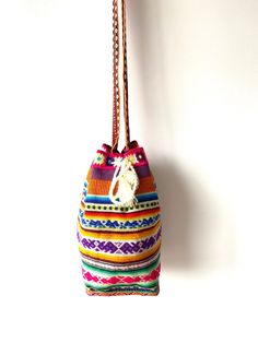 Measurements:  Height: 12 inches (32 centimeters) Base: 6 x 6 inches  (16 x 16 centimeters) Strap length : 44 inches (112 centimeters) Black lining inside. Bohemian Multicolor Bucket Bag For Travel, Bohemian Multicolor Fabric Shoulder Bag, Multicolor Bohemian Fabric Shoulder Bag, Multicolor Fabric Bags For Vacation, Multicolor Fabric Vacation Bags, Multicolor Cotton Hobo Bag For Travel, Bohemian Multicolor Fabric Bag, Colorful Handwoven Tote Bag, Multicolor Woven Crochet Travel Bag