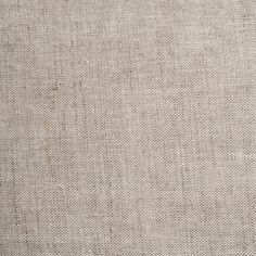 an upholstered fabric textured with linen