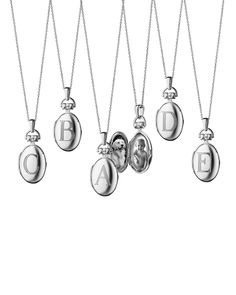 Sterling silver belcher chain and locket pendant. Oval pendant engraved with your choice of letter; holds two photos. Rock crystal detail on bale. 30"L chain; pendant, 3/4"L. Imported. | Monica Rich Kosann Petite Sterling Silver Initial Locket Necklace Treasure Necklace, Pearl Locket, Monica Rich Kosann, Handcrafted Silver Jewelry, Silver Jewellery Online, Jewelry Lockets, Sterling Silver Initial, Jewelry Luxury, Charm Necklaces