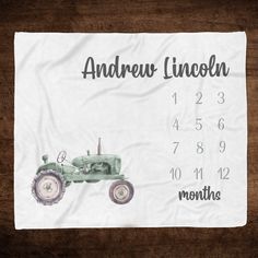 a baby's birth announcement with an old tractor