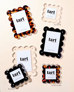 four black and white frames with the word tart on them in different shapes, sizes and colors