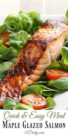 salmon and spinach salad on a plate with the words quick & easy meal maple glazed salmon