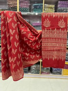 This is a beautiful organic cotton saree with handblock printed design  Fabric - Cotton Color - Rusty red  Technique - Hand block printed. Saree length - 5.5 mtr. Blouse - 1 mtr. Running but plain . Easy wash and care . Please note - color may be vary a little due to sunlight and photography . Please message us after purchasing in case you want fall and Pico done it not . No extra charges for fall and Pico but inform us . Blouse stitching is also available . Cotton Silk Saree With Batik Print For Festivals, Red Kalamkari Print Traditional Wear In Cotton Silk, Traditional Drape Mulmul Wear With Block Print, Traditional Wear With Block Print And Mulmul Fabric, Red Cotton Silk Traditional Wear With Kalamkari Print, Traditional Mulmul Wear With Block Print, Red Cotton Silk Saree With Kalamkari Print, Red Cotton Dupatta For Diwali, Diwali Cotton Saree With Printed Motifs