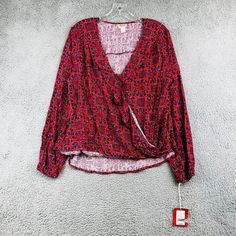 New Mossimo Womens Red Black V Neck Long Sleeve Bohemian Style L 7 Condition ~The Shirt Is New With Tag Attached. From Nonsmoking Environment. No Stains, Snags, Pilling, Odors, Or Excessive Signs Of Wear Unless Specifically Noted. Please See The Photo For Measurements. Shipping: Fast Shipping. All Items Will Be Shipped Within 1 Business Day Of Payment (Which Excludes Weekend And Holidays). Red Boho Print V-neck Top, Casual Red Blouse For Festival, Red Bohemian Fall Blouse, Casual Wrap Blouse For Festival, Red Boho Print Blouse For Vacation, Fall Red Rayon Blouse, Red Rayon Tops For Fall, Casual Floral Print Wrap Blouse, Red V-neck Rayon Blouse