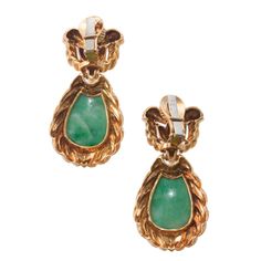 Pair of 18k gold drop earring by David Webb, with carved jade. DESIGNER: David Webb MATERIAL: 18k Gold GEMSTONES: Jade DIMENSIONS: Earrings are 49mm x 24mm. MARKED/TESTED: Webb, 18k. WEIGHT: 45 grams. CONDITION: Previously Owned, Excellent Condition. Luxury Jade Earrings For Formal Occasions, Formal Carved Yellow Gold Earrings, Carved Yellow Gold Earrings For Formal Occasions, Formal Carved Gold Earrings, Formal Gold Carved Earrings, Formal Jade Earrings, Elegant Carved Yellow Gold Earrings, David Webb, Color Pairing