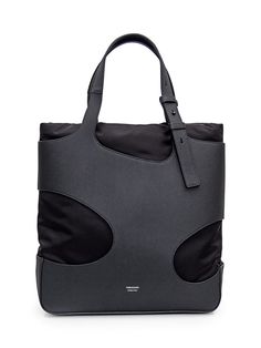 Black tote bag in grained leather. Interior lined with padded technical fabric. Adjustable leather handles. Inside zipper pocket. Logo on front. Width:38 Height:41Depth:13Gender: MenMaterial: OUTSIDE:100% CALFSKIN, 100% FABRICColor: BlackMade in: ITProduct ID: 241311 770070*Import tax/duty will be calculated at checkout (If applicable) Ferragamo Bag, Pocket Logo, Ferragamo Shoes, Black Tote, Leather Handles, Black Bag, Clothing Ideas, Black Tote Bag, Leather Interior