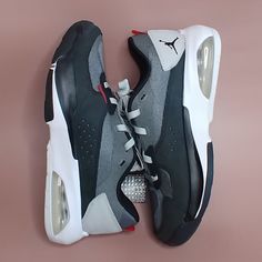 Brand New - Men's Jordan Air 200 E Sneakers - Sz - 8, 8.5, 9, 9.5, 10, 10.5, 11, 11.5 - Color Is Black/Grey/White - Shoe Comes In Original Box - Ships Same Day Modern Gray Sneakers With Air Max Cushioning, Dynamic Gray Sneakers With Air Max Cushioning, Gray Low-top Jordan Shoes For Light Sports, Gray Sneakers With Air Max Cushioning For Sports, Gray Basketball Shoes With Air Max Cushioning For Streetwear, Gray Air Max Cushioned Basketball Shoes For Streetwear, Gray Synthetic Sporty Basketball Shoes, Gray Jordan Shoes For Light Sports, Gray Low-top Air Max Running Shoes