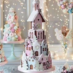 there is a cake made to look like a castle with snowflakes on it