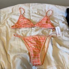 Green And Pink Plaid Pacsun Bikini! It Is Very Cute, Just Don’t Like How It Fits Me! It Is Brand New With Tags And The Hygienic Linger Is Still On Too. I Moved Recently And I Didn’t Get A Change To Return It. :) The Top Is A Large And The Bottom Is A Medium. Trendy Summer Swimwear For Brunch, Peach Swimwear For Vacation Beach Season, Peach Swimwear For Beach Season Vacation, Peach Swimwear For Beach Vacation, Peach Swimwear For Spring Beach Party, Peach Swimwear For Beach Party, Peach Swimwear For Vacation During Beach Season, Fitted Peach Swimwear For The Beach, Peach Beachwear Swimwear