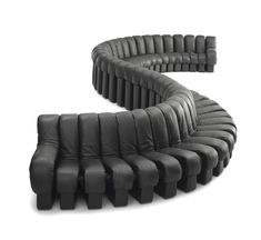 an image of a black leather chair that is shaped like a snake's tail