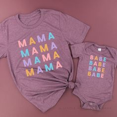 IMPORTANT NOTE: All Little Mama shirts are unisex sizing. That means they run slightly larger than typical women's shirts and slightly smaller than typical men's shirts. We recommend ordering your normal size for a loose fit, or sizing down for a more fitted look. Women sometimes prefer to size down in unisex sizing. If in between two sizes, most people are happy with the smaller option. Please reference all size charts before purchasing. SHIPPING DETAILS: - All shirts are shipped via USPS First Family Matching Multicolor Tops With Letter Print, Family Matching Multicolor Letter Print Tops, Multicolor Letter Print Family Matching Tops, Multicolor Letter Print Tops For Family Matching, Family Matching Multicolor Tops With Name Print, Family Matching Multicolor Letter Print Shirt, Matching Cotton Tops With Letter Print, Fun Multicolor Tops With Name Print, Matching Letter Print Cotton Top