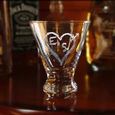 an obx glass sitting on top of a wooden table