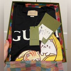 Purchased This T-Shirt At The Gucci Store Downtown Chicago, But Never Ended Up Using It. It’s Brand New With Tags And Also Included Is A Gucci Box. I Also Have The Exact Same One In Size Xl If Interested. Please Feel Free To Check Out My Other Listings. Gucci Designer Black T-shirt, Designer Gucci Black T-shirt, Gucci Black T-shirt With Logo Print, Black Gucci Tops With Letter Print, Gucci Black Crew Neck Top, Gucci Black Short Sleeve Tops, Black Gucci Short Sleeve T-shirt, Gucci Black Tops With Letter Print, Gucci Black Top With Letter Print