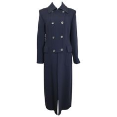 - Unworn Gucci by Tom Ford Navy Wool Maxi Coat from Fall 1996 collection. It is a truly collectable item - Featuring epaulettes on the shoulders, a hook fastening on the collar, eight front buttons, zipper closure, three buttons on each cuff, two flap pockets. - A signature gold buckle at the back. - Made in Italy. - Size 40. -100% Wool. Lining: 100% Rayon. Dior Price, Wool Maxi Coat, Gucci By Tom Ford, Versace Couture, Gucci Outfits, Vintage Coats, Black Wool Coat, Long Wool Coat, Maxi Coat