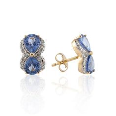 This is part of Chairish’s Fine Jewelry assortment.  Natural Diamond and Blue Sapphire Pushback Stud Earrings in 14K Gold. Embrace your look with these stunning pair of earrings suitable for any occasion to complete your outfit. Sapphire stimulates concentration and reduces stress.  Featuring 0.42 carats of blue sapphire with diamonds around in 14K Yellow Gold, this beautiful pushback stud earrings is a great gift for anyone on your list.  PRODUCT DETAILS :-  Material - 14K Solid Yellow Gold Gemstone - Blue Sapphire  Gemstone shape - Pear  Gemstone Weight - 0.42 ct Gemstone Size - 5 x 5 mm  Diamond Weight - 0.42 ct  Diamond Size - 1 mm Gross Weight - 2.77 Grm Setting - Prong setting Length - 11 mm Width - 7 mm Blue Diamond-accented 14k Gold Earrings, Blue Diamond Accent 14k Gold Earrings, Blue Diamond Accent Earrings In 14k Gold, Gold Art Deco, Art Deco Diamond, Gold Art, Sapphire Gemstone, Diamond Sizes, Solid Yellow