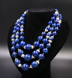 Elegant vintage necklace of blue pearls, imitation lapis lazuli, 3-row climbing, with rhinestone bells. Beautiful closure with blue inlay and rhinestones. Jewel of beautiful workmanship in good vintage condition. Made in Italy Length on the first lap 45.5 cm. International customers: I ship with international registered tracked mail. If you plan to order more than one item, please message me before placing an order, and I can adjust the shipping to reflect the correct weight and cost. Please mak Blue Pearls, Color Stone, Necklace Blue, Blue Pearl, Multi Strand Necklace, Strand Necklace, Multi Strand, Vintage Necklace, Lapis Lazuli