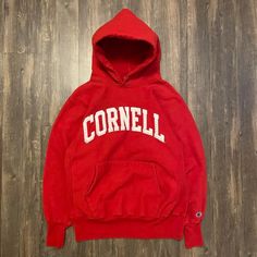 Vintage 1990s Cornell University Champion Reverse Weave Hoodie Red Vintage Made In The Usa 90s Champion Reverse Weave Hoodie With A Cornell Spell Out. Amazing Condition! Small Blemish On Waist Band Size Large Fits Like A Medium 22 Inches Pit To Pit 26 Inches In Length #Reverseweave #Champion #Vintagechampion #Vintage #Cornell 90s Style Winter Hoodie With Double-lined Hood, Red Hoodie With Letter Print For College, Red Letter Print Hoodie For College, Retro Winter Hoodie With Ribbed Cuffs, Winter Retro Hoodie With Ribbed Cuffs, Red Collegiate Hoodie For Winter, 90s Style Red Sweatshirt For Winter, Oversized Vintage Hoodie For College, Red College Hoodie For Fall