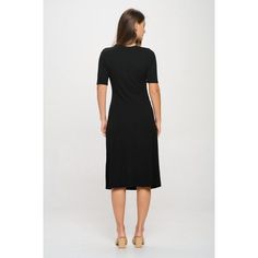 Our Darcy Midi Dress offers a flattering fit for any occasion. The crew neck and Rib Knit material provide a comfortable and versatile style. Elevate your wardrobe with this timeless piece. Made in USA. Machine washable Black Ribbed Dress With Crew Neck, Chic Black Crew Neck Midi Dress, Black Ribbed Crew Neck Dress, Black Fitted Midi Dress With Crew Neck, Fitted Casual Midi Dress With Crew Neck, Black Fitted Crew Neck Midi Dress, Casual Fitted Crew Neck Midi Dress, Black Crew Neck Midi Dress For Summer, Modest Fitted Black Midi Dress