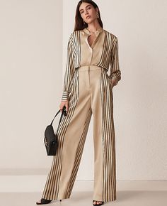 Our pleated wide leg pant is a modern must-have, with a perfect drape and high waist that endlessly flatters. Front zip with double hook-and-bar closure. Belt loops. Front pleats. Front on-seam pockets. Back besom pockets. Lined.,Leg Shape:Leg Shape: Wide Leg – a modern must-have with a statement leg and flattering high waist,Rise:High rise: sits 1/2" to 1" below natural waist,Imported:Imported,Fit:Fit: Relaxed & easy,Length:Full length: 29 1/2" inseam with 24" leg opening,Fabrication:100% Polyester,Garment Care:Machine Washable The Petite Pleated Wide Leg Pant in Satin by Ann Taylor Size petite - 0 Toasted Oat Women's Regular, Wide, Leg, Pants, 100%, Polyester, Machine, Washable Satin Clothing, Work Sweaters, Knitted Suit, Womens Workout Outfits, Wide Leg Pant, Petite Tops, Midi Maxi Dress, Collared Shirt, Pants Pattern