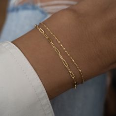 2 Bracelets in 1! You get a super cute paperclip and diamond cut chain bracelet, all in one! This set is beautiful, minimalistic, and dainty. Perfect for everyday wear! - - D E T A I L S - - ▪︎ VERY THICK plating of 14k gold or Rhodium over 925 Sterling Silver ▪︎ High quality and dainty ▪︎ Available in 5.5", 6.25", 6.75" + .5" Extension ▪︎ Lobster Claw Closure ▪︎ Bracelets are attached ▪︎ Nickel-free & Hypoallergenic  ▪︎ Matching Anklets available! https://www.etsy.com/listing/1501816906/dainty- Simple Gold Chain Bracelet, Dainty Gold Bracelet Classy, Small Gold Bracelet, Silver And Gold Bracelets, Silver Dainty Bracelets, Simple Chain Bracelet, Cute Gold Bracelet, Permanent Jewelry Stack, Jewelry Accessories Gold