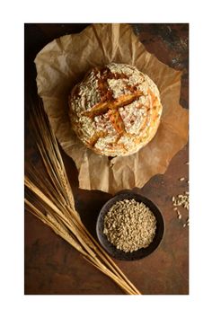 bread and oats on a brown table