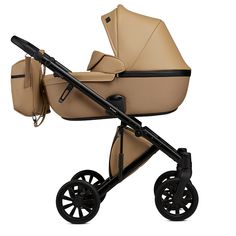 a baby stroller that is beige and black