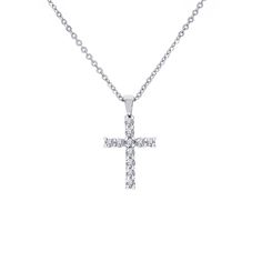 A Beautiful Symbol Of Faith And Love, This Cross Grabs The Eye - And The Heart. Fashioned In 14k (Cross) And 10k (Chain) White Gold, This Traditionally Styled Cross Is Completely Lined With Shimmering Diamond Accents In 0.29 Total Carat Weight. Polished To A Brilliant Shine, This Exceptional Cross Suspends From An 16" Inch. Cable Chain And Secures With A Spring-Ring Clasp. Diamonds Color And Clarity G Si1. Cross Weighs 1.9 Grams. Its Width 10.4 Mm And Length 18.5mm. Wdc1501 Classic Vvs Clarity Diamond Cross Pendant Necklace, Classic Cross Pendant Necklace With Prong Setting, Classic Platinum Necklaces With Pave Setting, Classic Platinum Necklace With Pave Setting, Classic Cross Pendant Necklaces With Prong Setting, Classic Necklaces With Cross Pendant In Prong Setting, Classic Diamond Necklace With Brilliant Cut Cross Pendant, Classic Diamond Cut Cross Pendant Necklace, Classic Brilliant Cut Diamond Cross Pendant Necklace