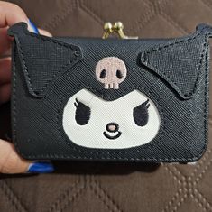 An Adorable, Cute Kuromi Wallet! It's Technically Brand New, Though I Did Use It A Couple Of Times, But It Was Rare. Thus, There Is No Damage Or Stains To It. The Wallet Has 4 Pockets To Hold Your Cards. There's The Main Pocket For Cash And A Place For Your Coins! If You Have Any Questions, Don't Hesitate To Message Me Privately! Thank You. ^^ Cute Black Wallet As Gift, Cute Black Wallet Perfect For Gift, Cute Black Wallets For Gift, Cute Black Wallets For Gifts, Cute Black Coin Purse For Gift, Cute Black Coin Purse As Gift, Cute Black Wallet For Daily Use, Cute Black Coin Purse For Everyday, Cute Black Coin Purse For Everyday Use