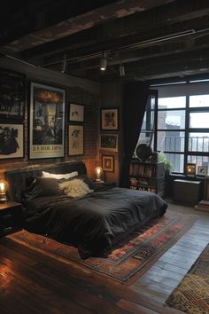 a bed sitting in a bedroom next to a window with lots of pictures on the wall