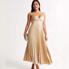 Beautiful Gisele Pleated Maxi Dress In Champagne - Size M. Has A Bit Of A Gold Tint! Note: I Purchased This From Another Seller Nwt But Ended Up Not Needing It. It Came With Some Small Imperfections As Seen In The Last Few Photos But They Are Extremely Hard To See Except For Up Close! Perfect For Wedding Guest Or Bridesmaid! Gold Pleated Dress, Popular Bridesmaid Dresses, Flattering Maxi Dress, Europe 2024, Abercrombie And Fitch Dresses, Golden Dress, Tiered Skirts, Wedding 2024, Pleated Maxi Dress