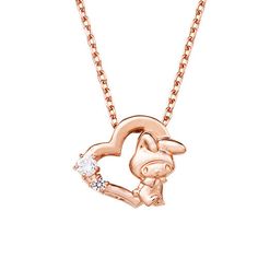 a rose gold necklace with an image of a pig holding a heart and a diamond